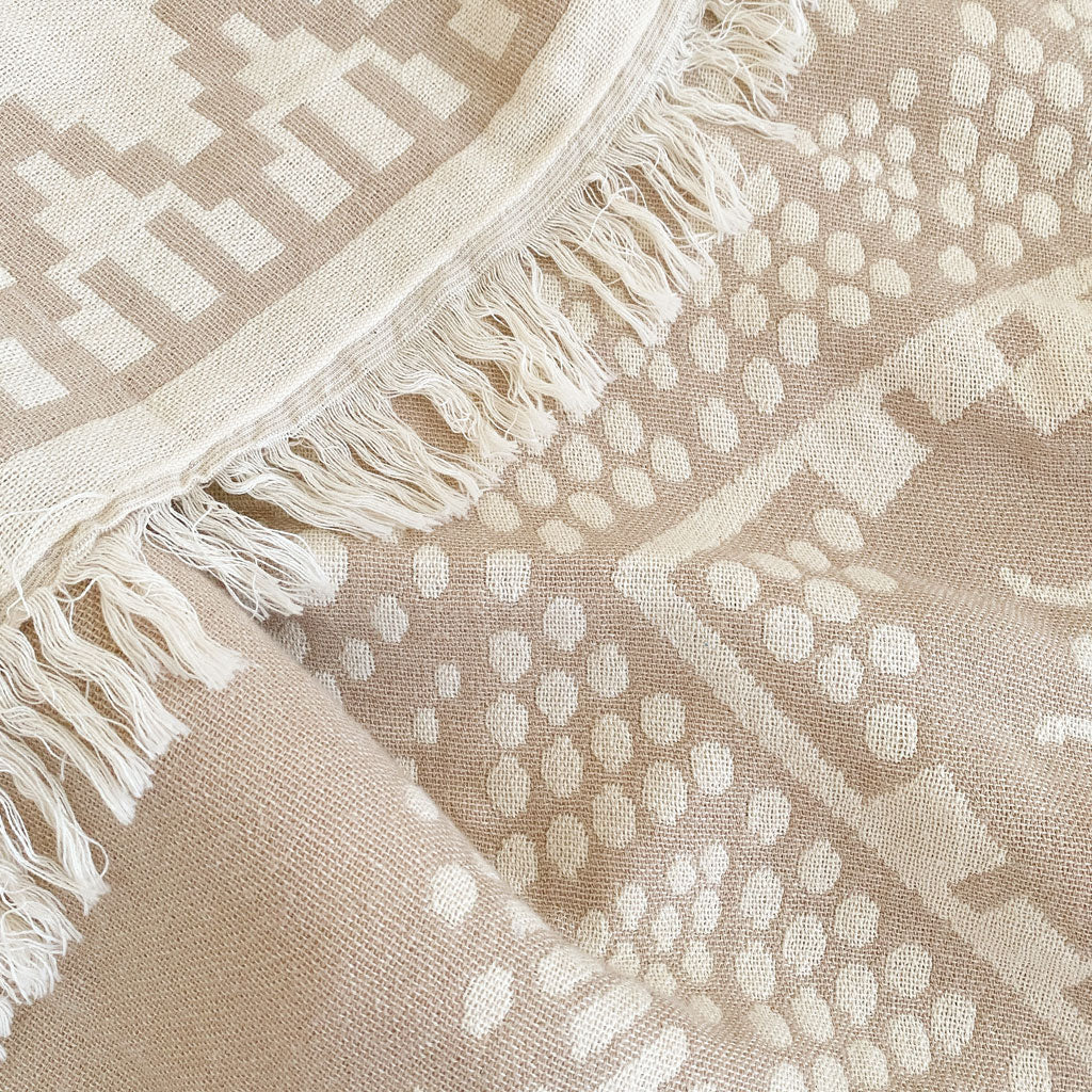 The Sunset Reversible Poncho - Sand/Natural